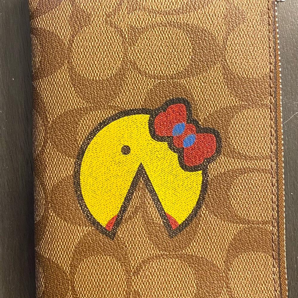 Coach ms. pacman wristlet
